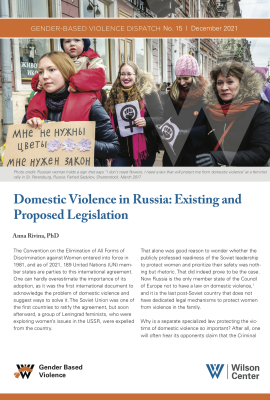 Russian woman holds a sign that says “I don't need flowers, I need a law that will protect me from domestic violence" at a feminist rally in St. Petersburg, Russia