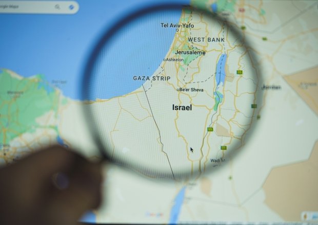 Map of Israel and Vicinity Showing Gaza Strip under a magnifying glass