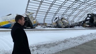 Estonian Secretary General for the Ministry of Foreign Affairs Jonatan Vseviov surveys damage from Russian military attacks at Antonov Airport in Hostomel, Kyiv Oblast, Ukraine