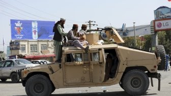 Taliban Fighters in Humvee