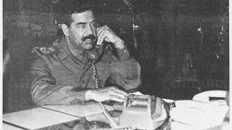 Saddam on a phone call