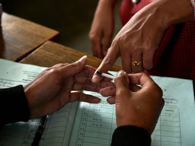 Finger being inked before voting in Indian elections