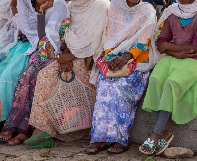 Tigray women resting in street market in center of Aksum