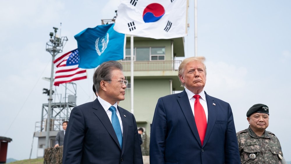 President Moon Jae-In stands with President Donald Trump at the Demilitarized Zone.