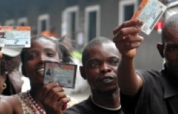 Congolese with their voting cards