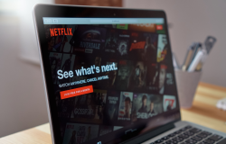 Laptop with Netflix Open Reading 'See What's Next.'