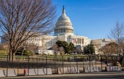 Capitol building behind barricades