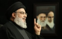 Nasrallah with Khamenei and Khomeini photo